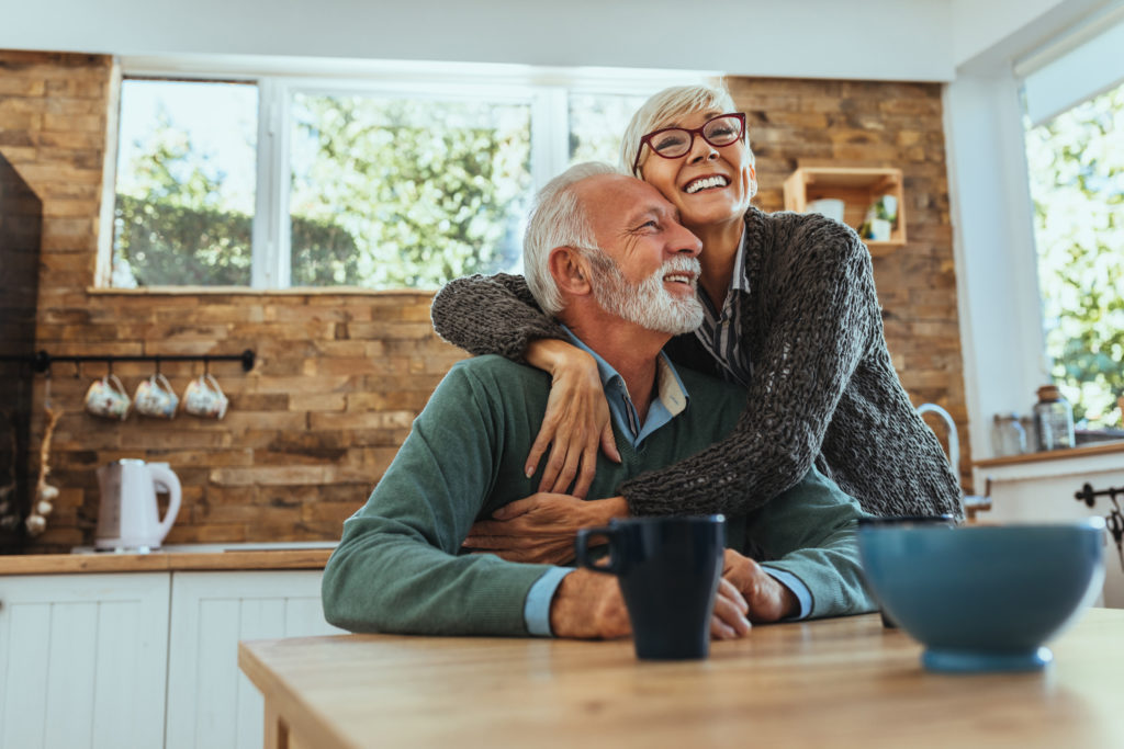 Woman Hugging Her Husband